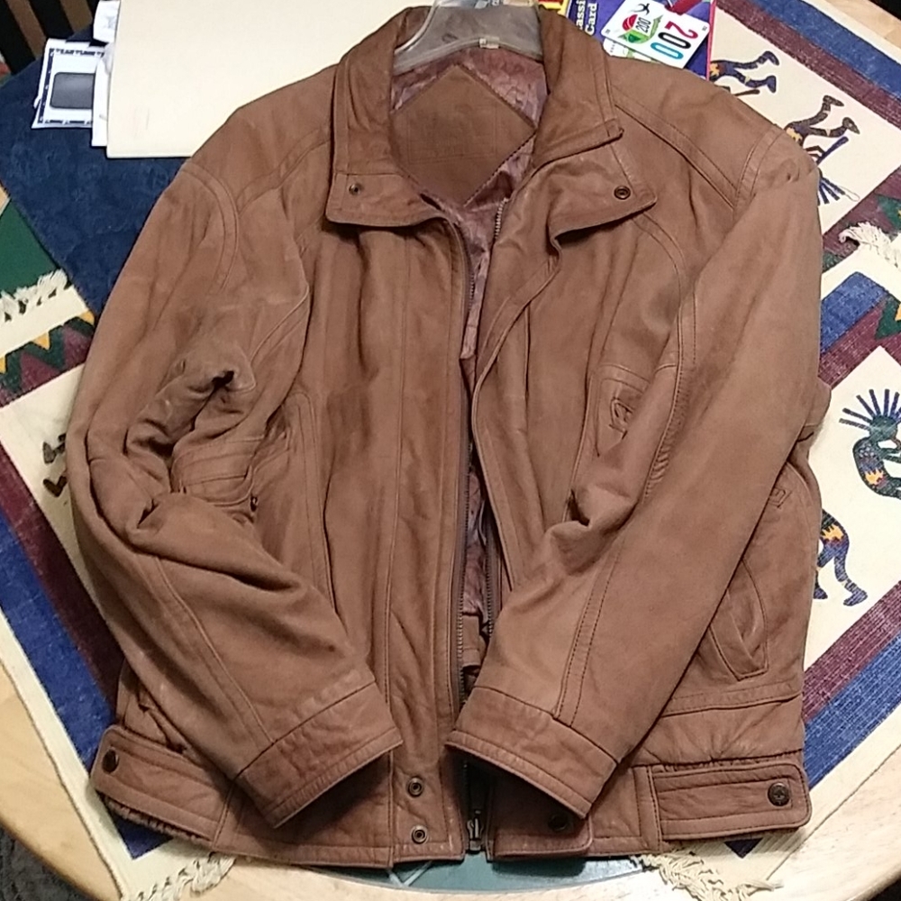 Men's large or women's extra large leather coat.